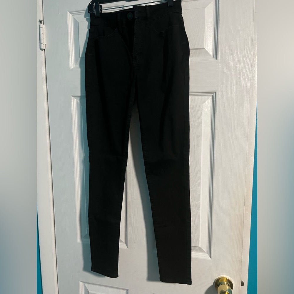 I am selling black jeans. They are barely worn.